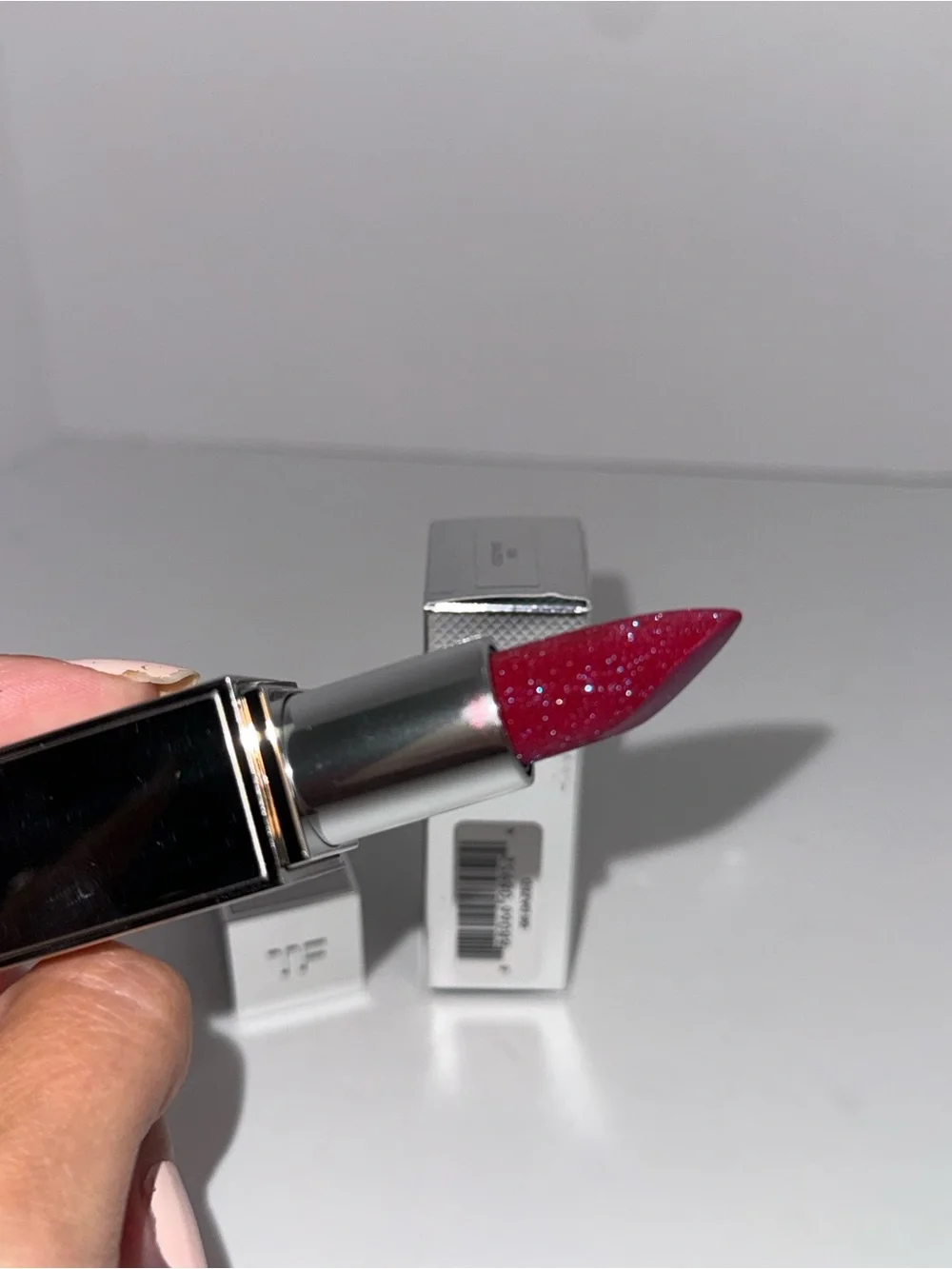 Tom Ford extreme lip spark 08 Dazed. Vibrant pink/purple with shimmer.